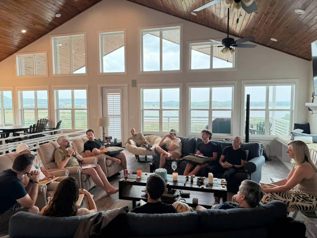 Royals members in circle during a session at the Canyon Lake retreat
